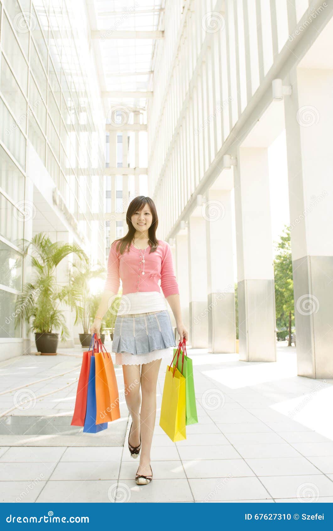 Asian Woman Walking Out From Shopping Mall Stock Photo Image Of