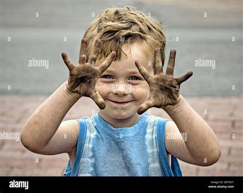 Boy With Dirty Hands Stock Photo Alamy