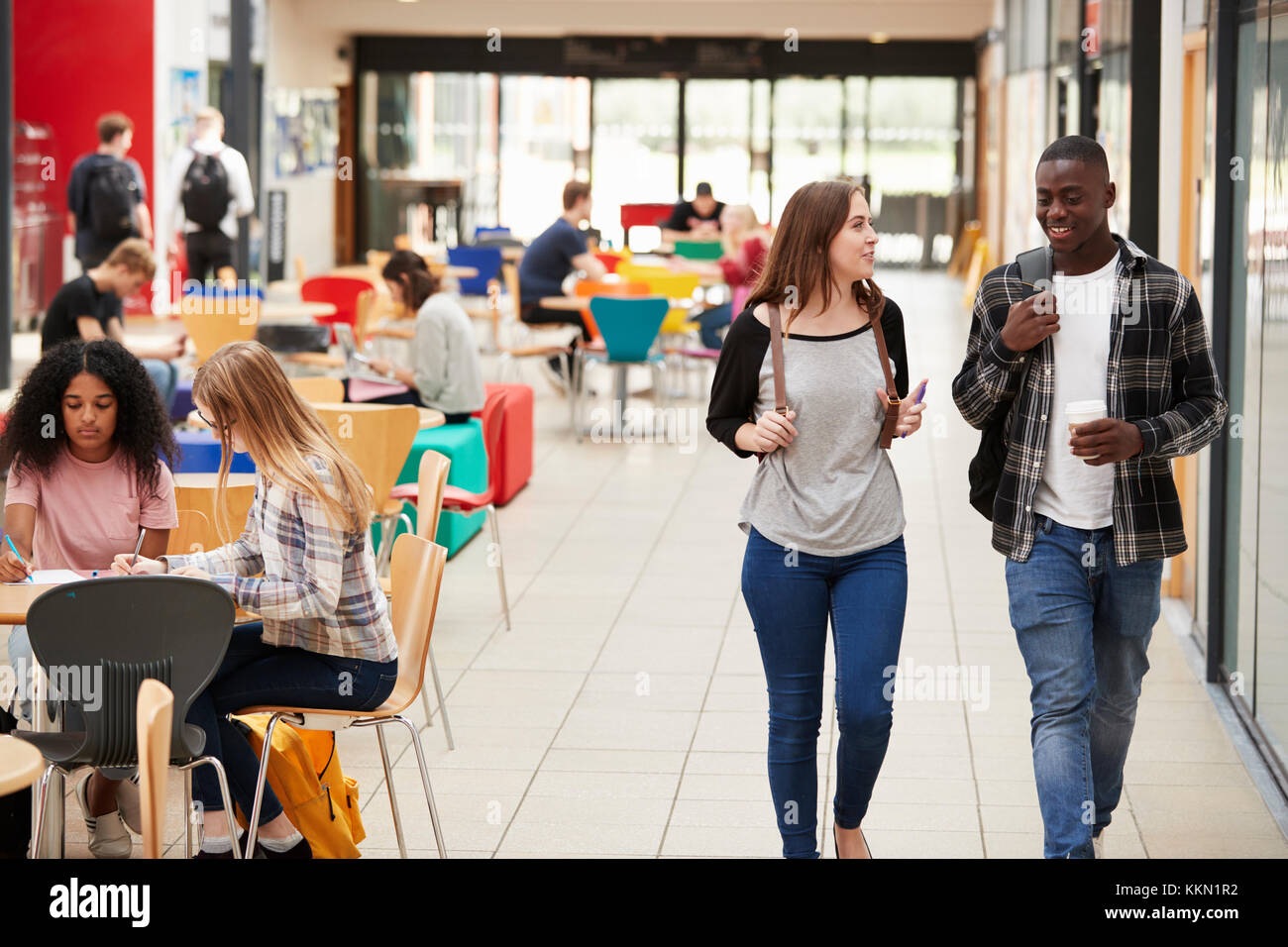 Communal Area Of Busy College Campus With Students Stock Photo Alamy