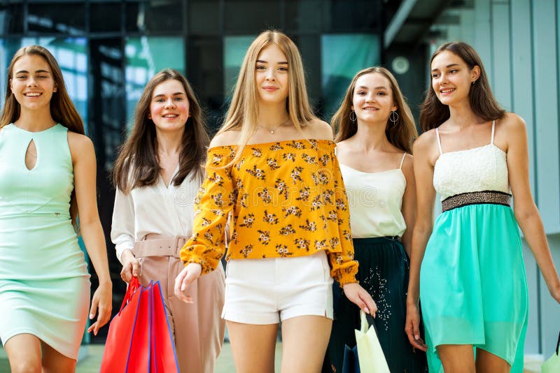 Five Happy Young Women Are Walking In The Mall Stock Photo Image Of