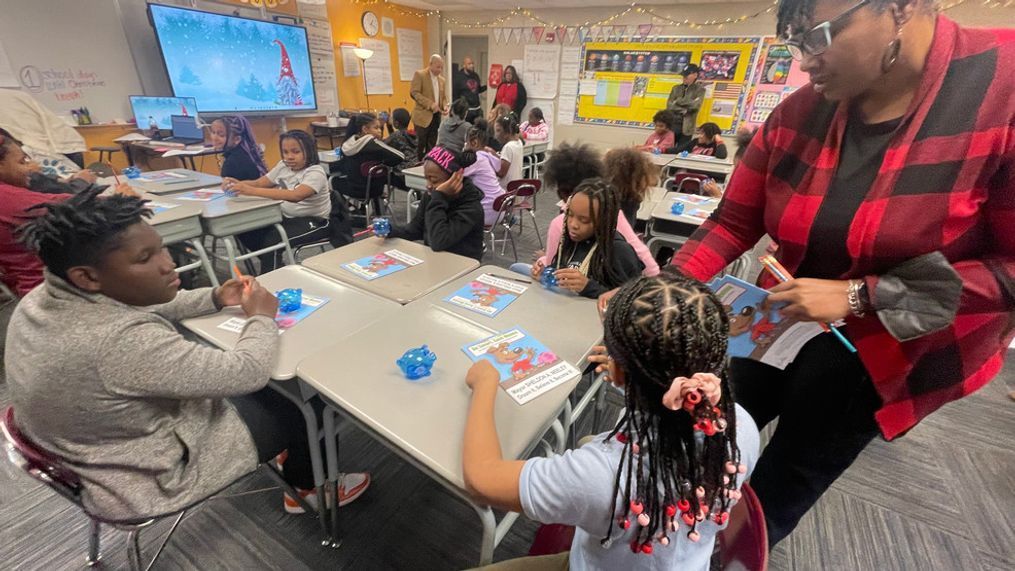 Mayor Neeley Delivers Piggy Banks To Students At International Academy